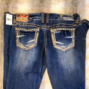 Amethyst jeans, low rise, size 3. New with tags, wider leg, distressed.